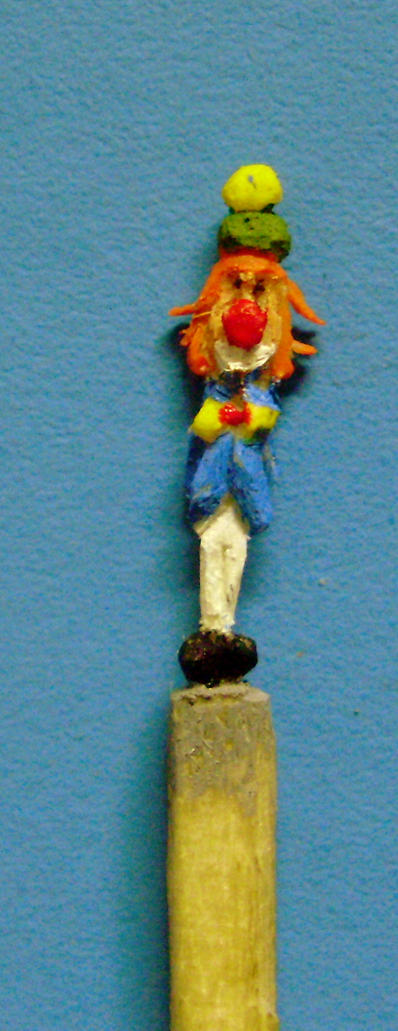 carved clown matchstick