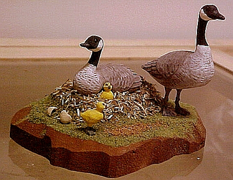hand carved wood miniature Canada goose family