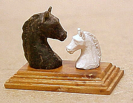 Soapstone and limestone hand carved horses