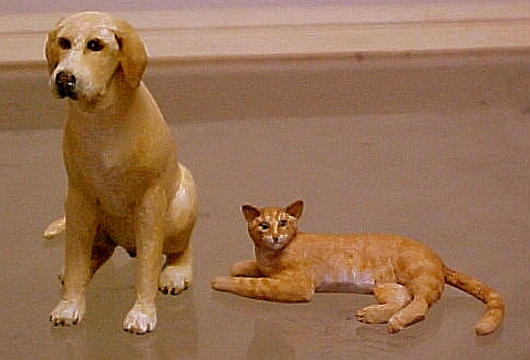 hand carved wood miniature yellow lab and orange tabby